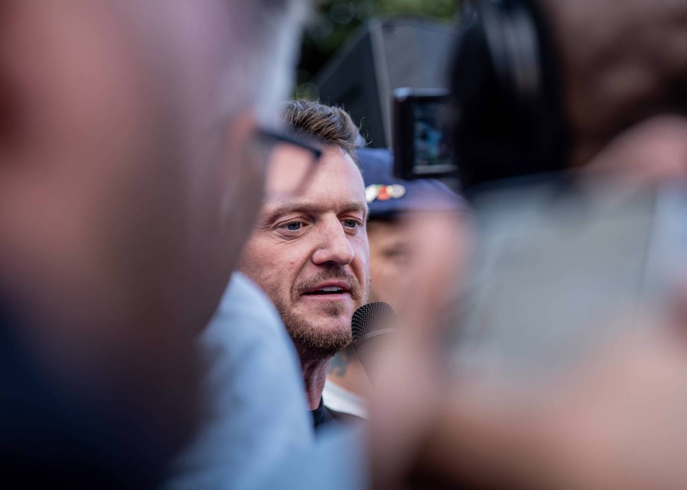 British activist Tommy Robinson detained at Heathrow Airport