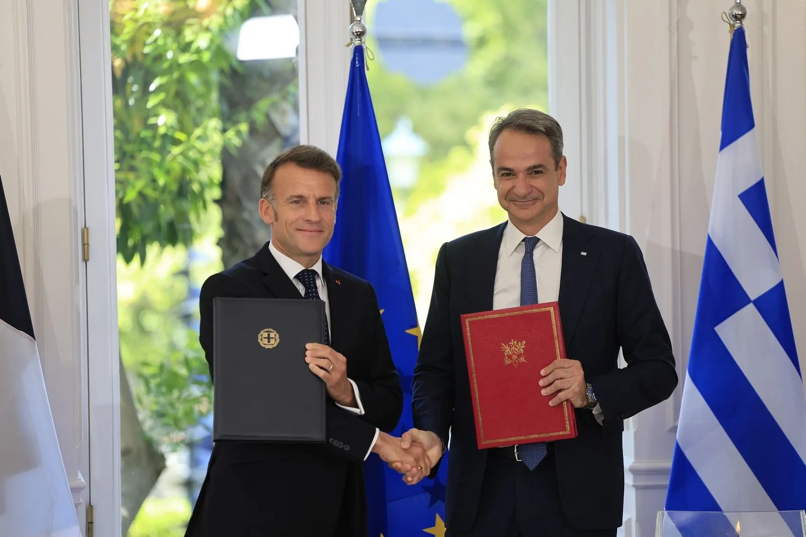Mitsotakis and Macron on frigate Kimon as Greece-France deals signed